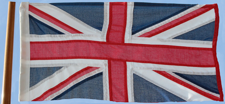 The Union Flag flown correctly. The wide white band next to the pole, is uppermost