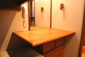 The desk top deployed in the bunk cabin