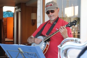 Jean-Aubert, band leader and retired heart surgeon, played guitar and banjo